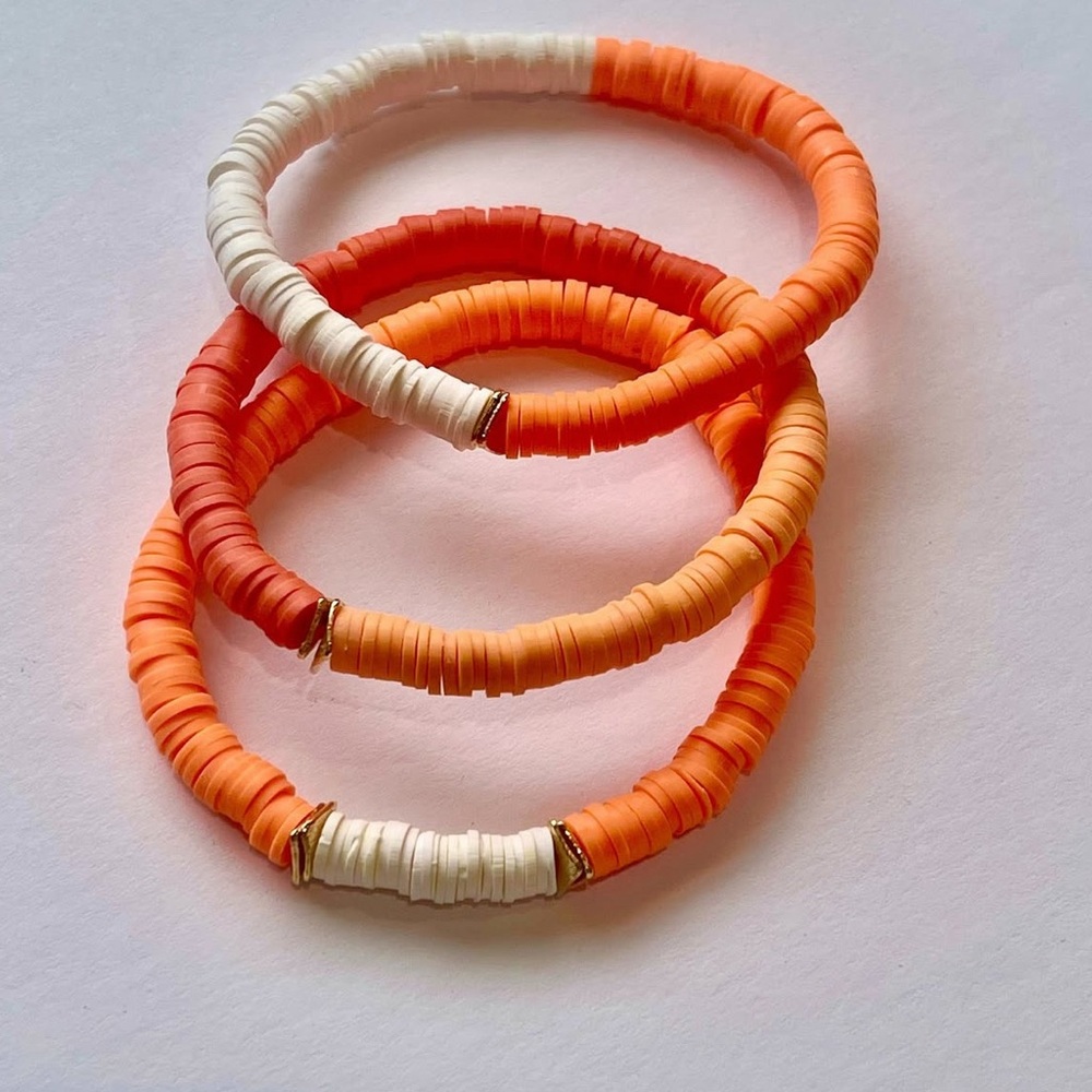 Orange and White Beaded Bracelets